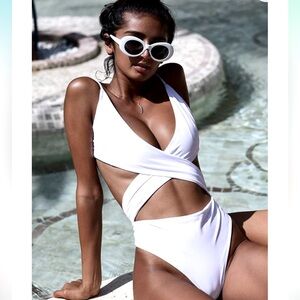 Unworn white cross cross high cut monokini